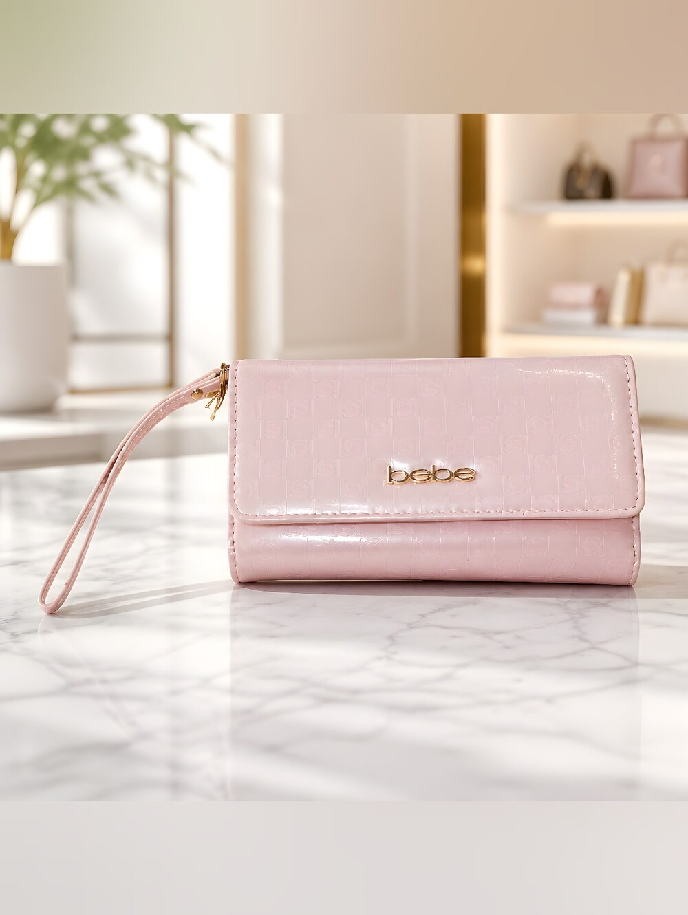 bebe Ravina Embossed Trifold Wristlet In Blush